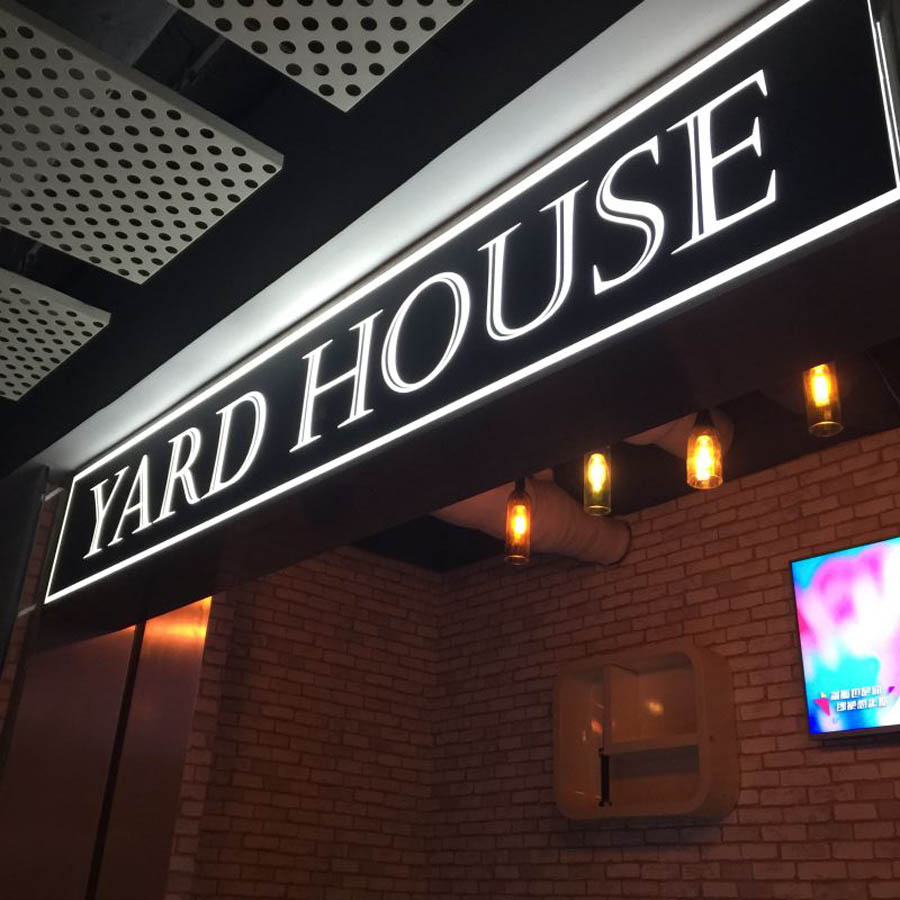 Yard House sign and bar lights in Asia